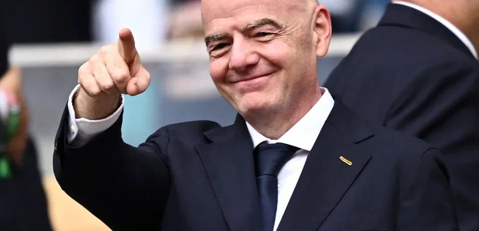 FIFA official gesturing during an event