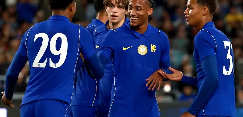 Chelsea players celebrating a goal together