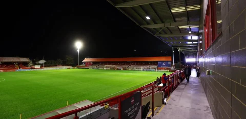 Stadium view at night with bright floodlights