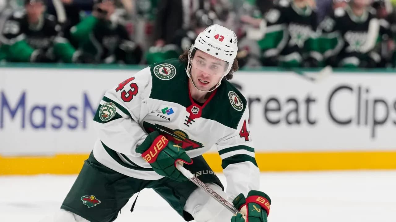 Hockey player skating on the ice during match