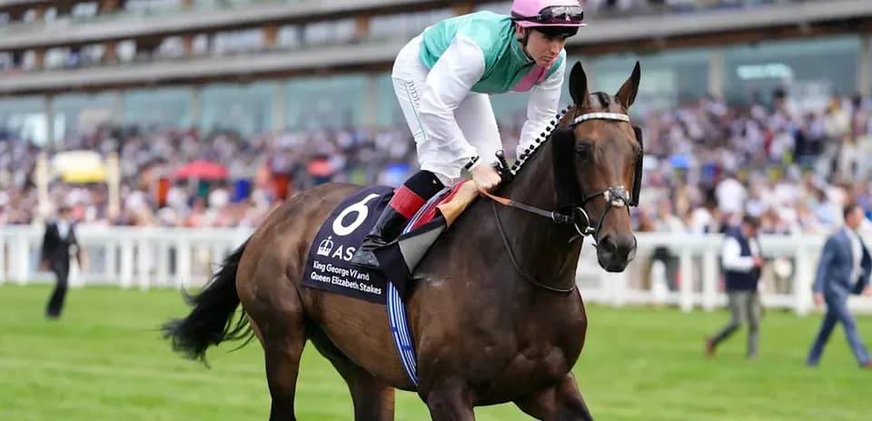 Jockey riding horse at King George V race