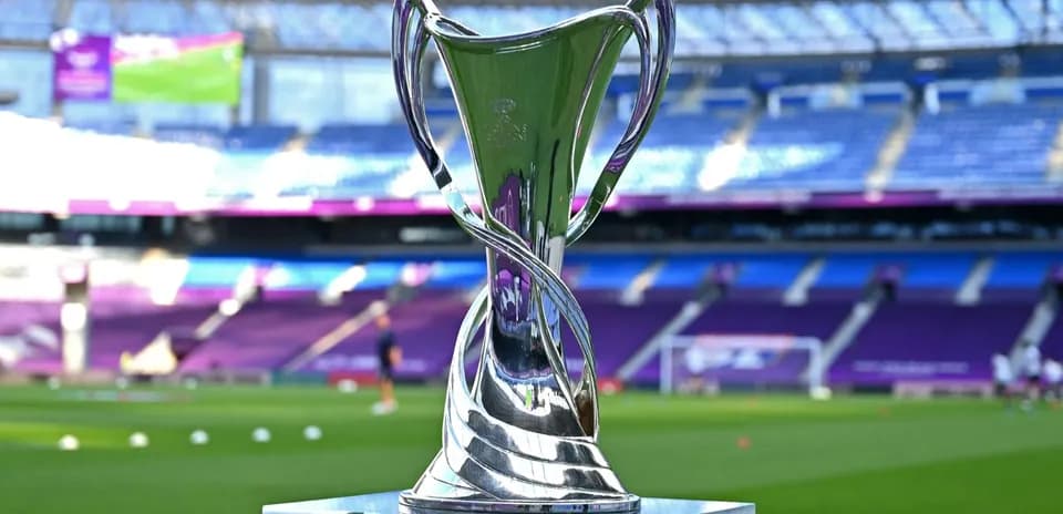 Trophy displayed on pitch before football match