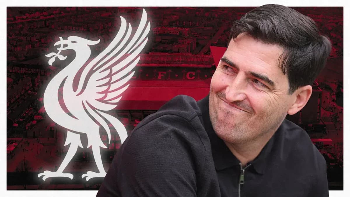 Liverpool logo with a man smiling in foreground