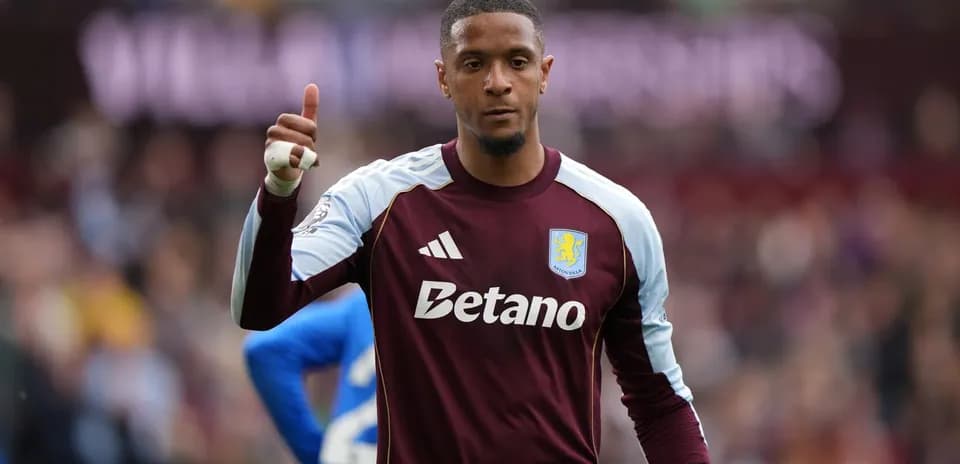 Aston Villa goalkeeper giving thumbs up during match
