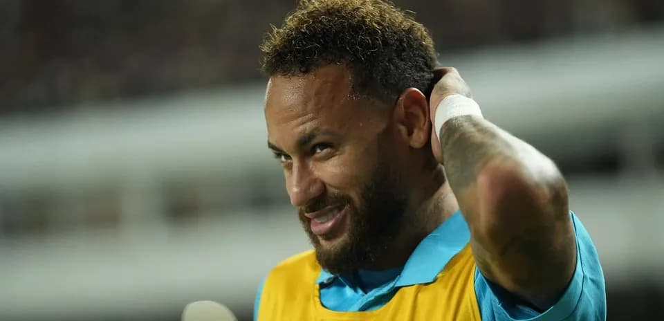 Neymar adjusting his hair during warm-up