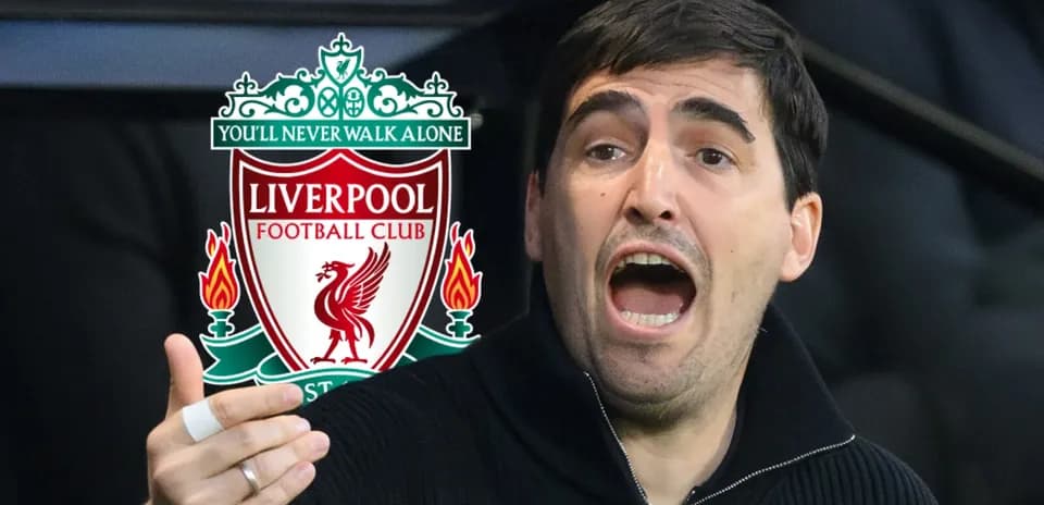 Coach gesturing passionately during Liverpool match