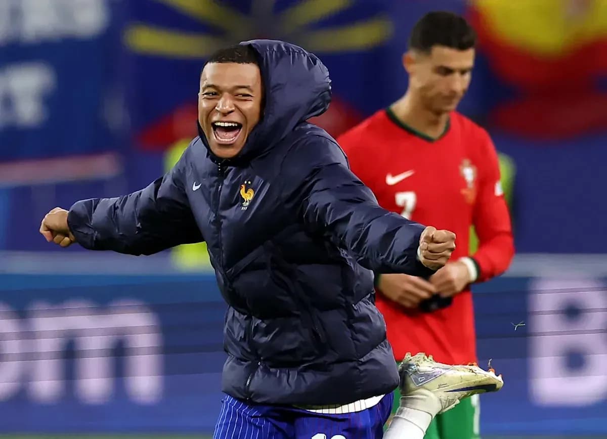 Mbappe celebrating in France jacket, Ronaldo in background