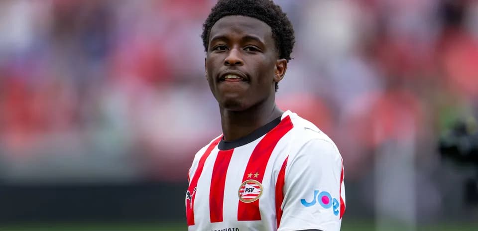 PSV player in home kit during match warm-up
