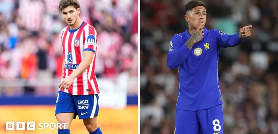 Atletico and Chelsea players during match action