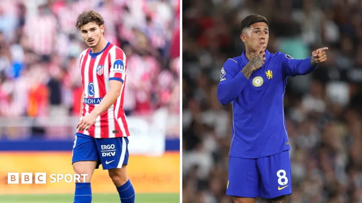 Atletico and Chelsea players during match action