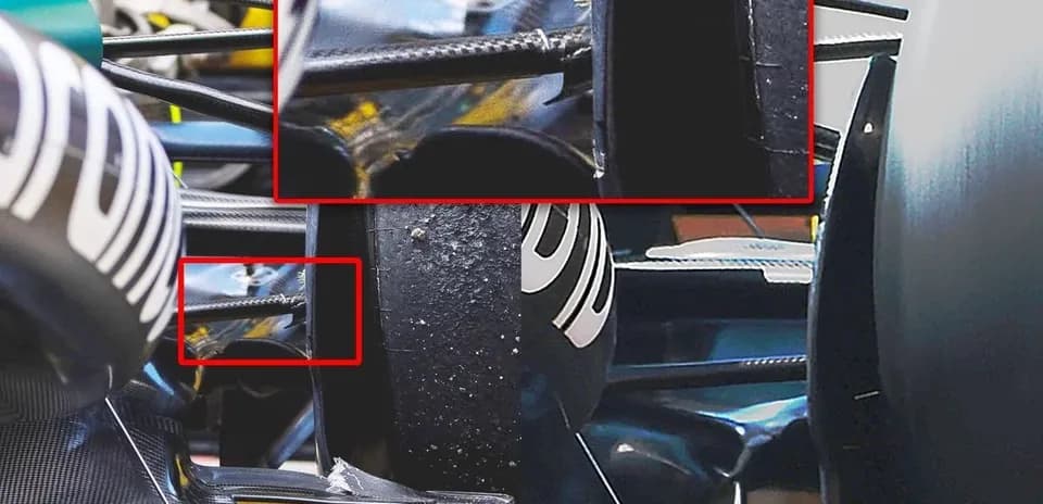 Close-up of Formula 1 car's rear suspension components