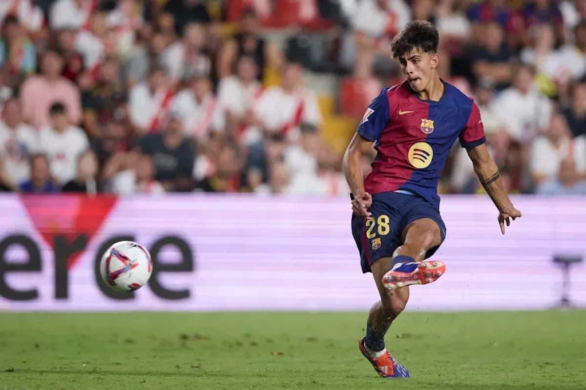 Barcelona player striking the ball during match
