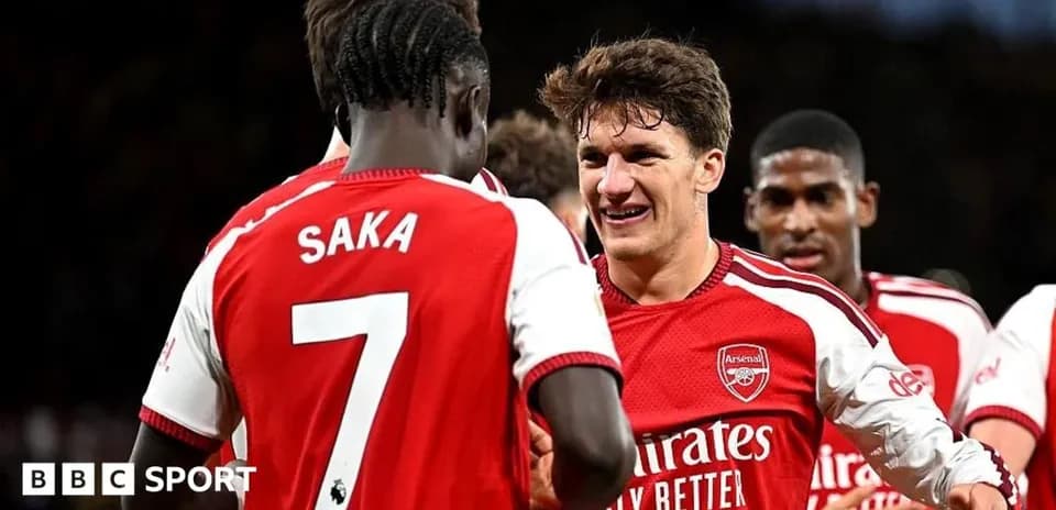 Arsenal players celebrating a goal during match