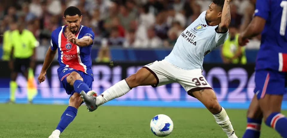 Player kicking the ball during a football match