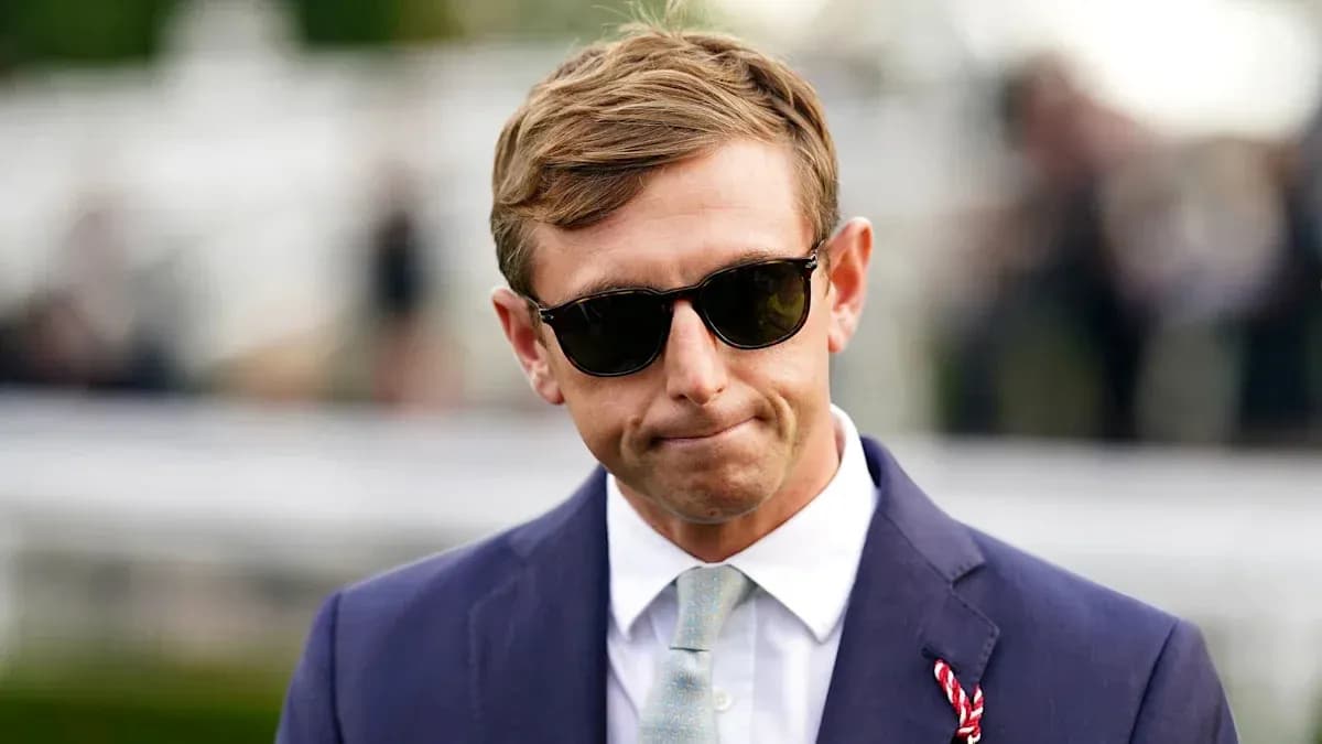 Man in sunglasses wearing a suit outdoors Man in sunglasses wearing a suit outdoors