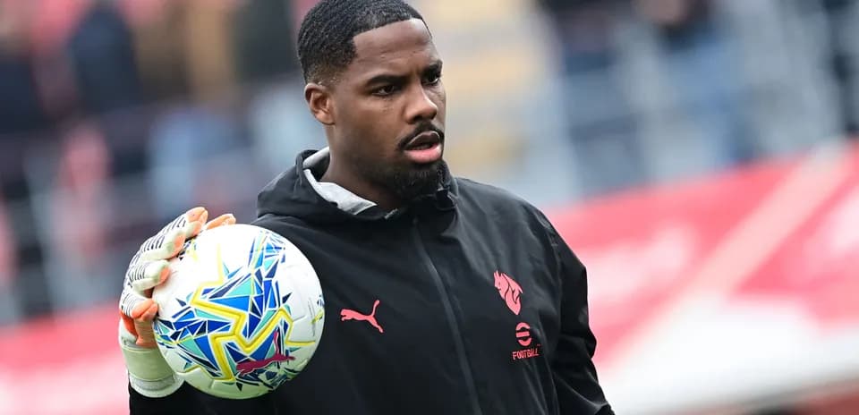 Goalkeeper holding a ball before the match
