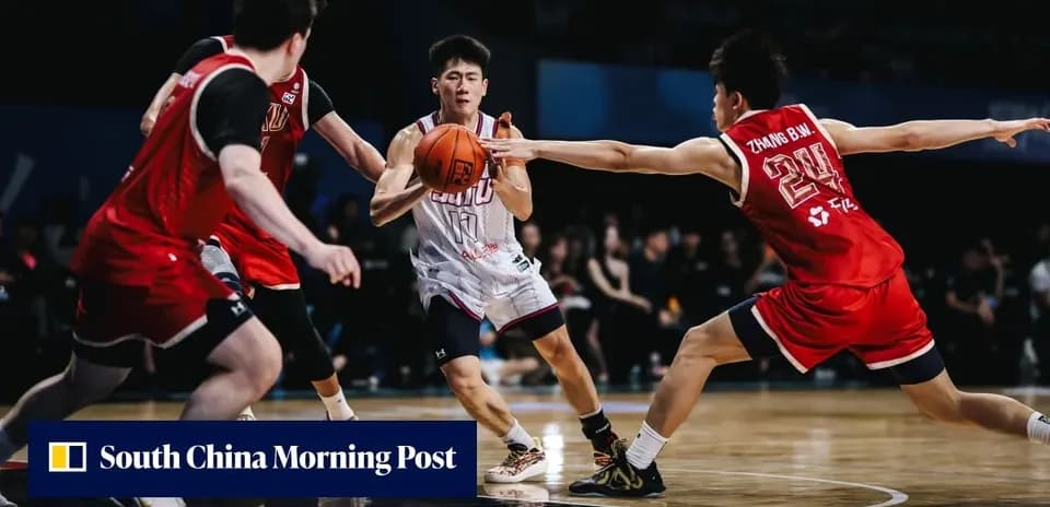 Three basketball players competing for the ball