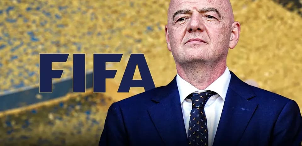 FIFA logo with official speaking at event