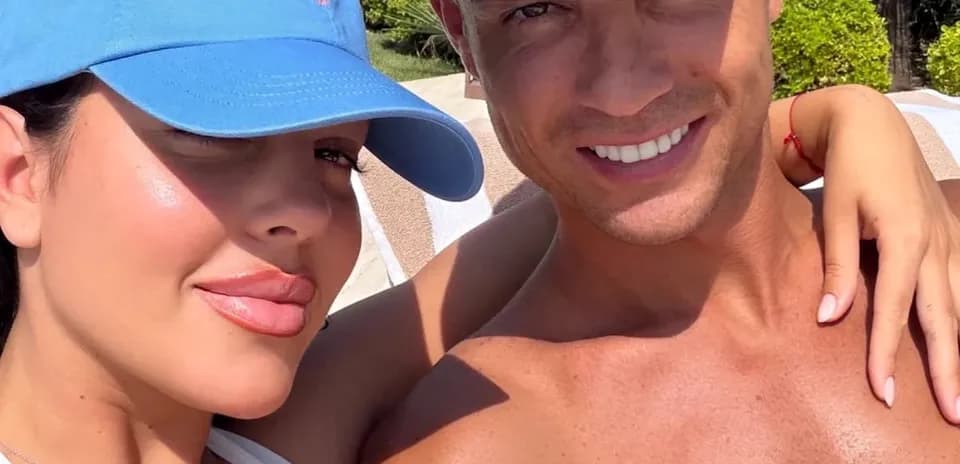Couple posing for a selfie in the sun