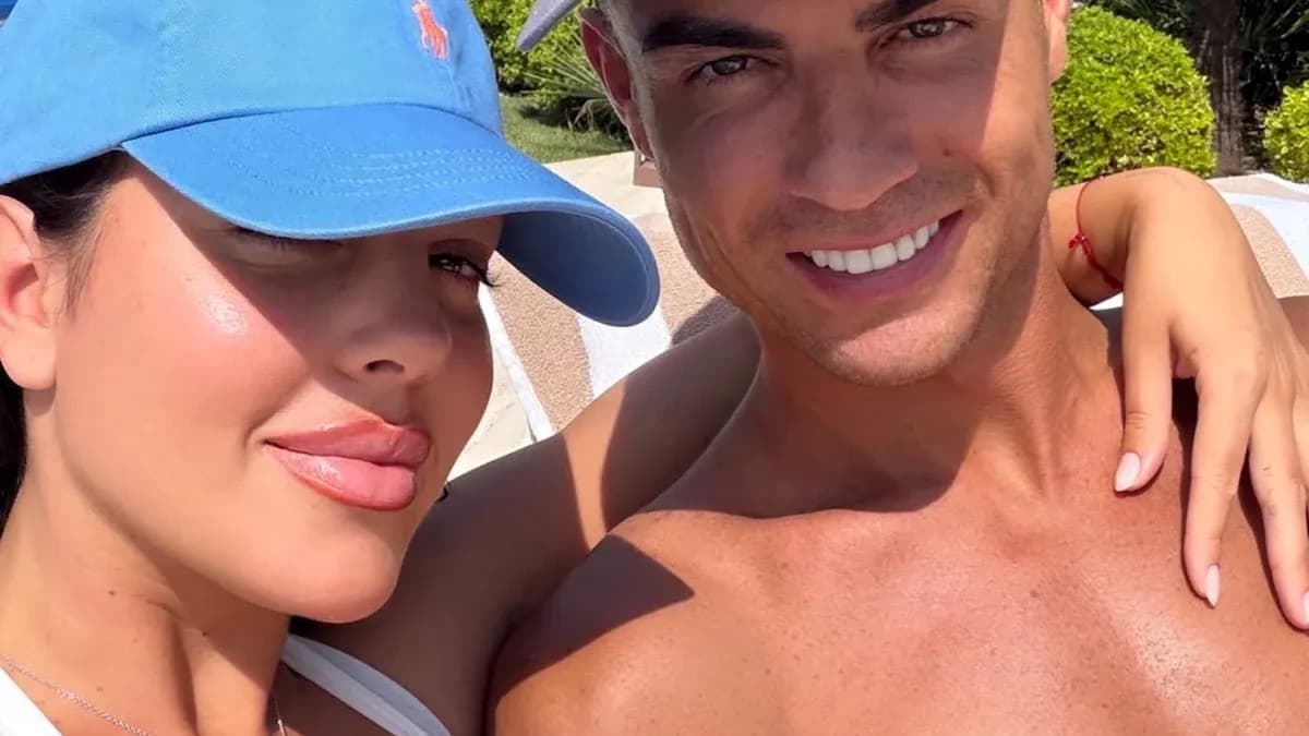 Couple posing for a selfie in the sun