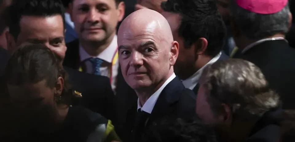 FIFA president in crowded event atmosphere