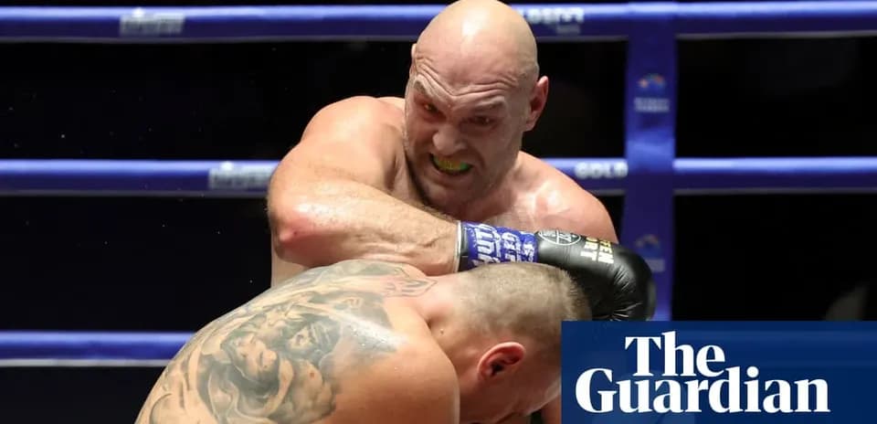 Boxer delivering a punch during a match