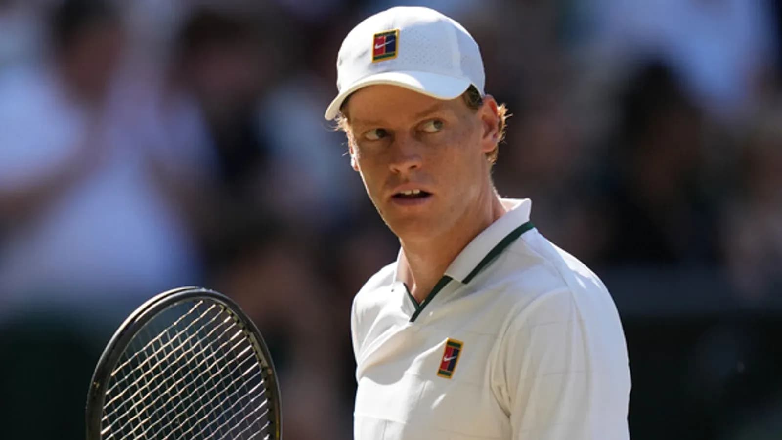 Tennis player holding racket during match
