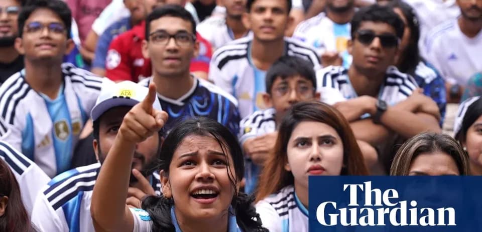 Argentina fans watching a match with excitement