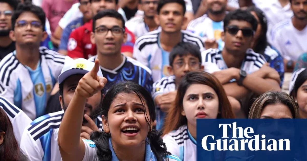 Argentina fans watching a match with excitement