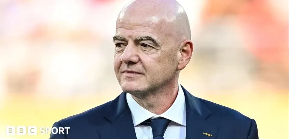 FIFA president standing before a match event