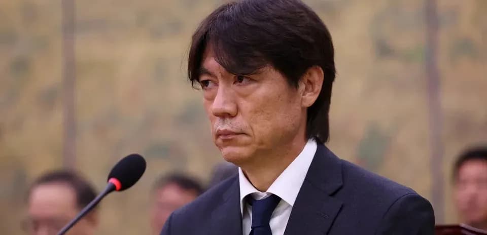 Kishi Shuuji speaking at a press conference