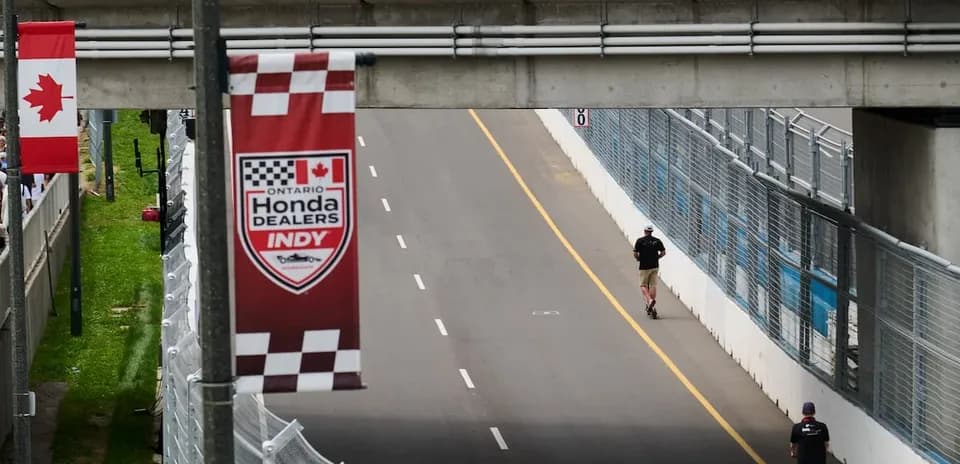 Person jogging on the track at Indy event