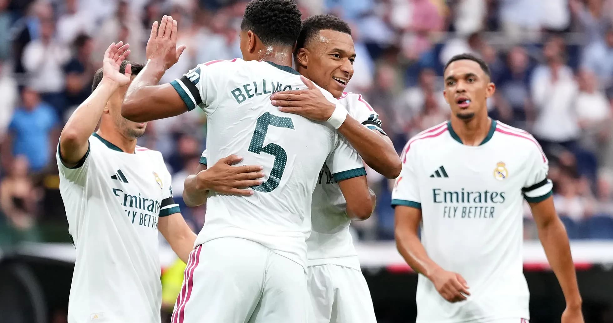 Real Madrid players celebrating a goal on the pitch