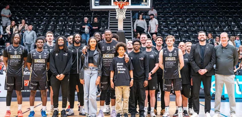 Newcastle Eagles team posing together on court