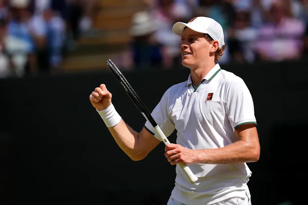 Tennis player celebrating during match at Wimbledon Tennis player celebrating during match at Wimbledon