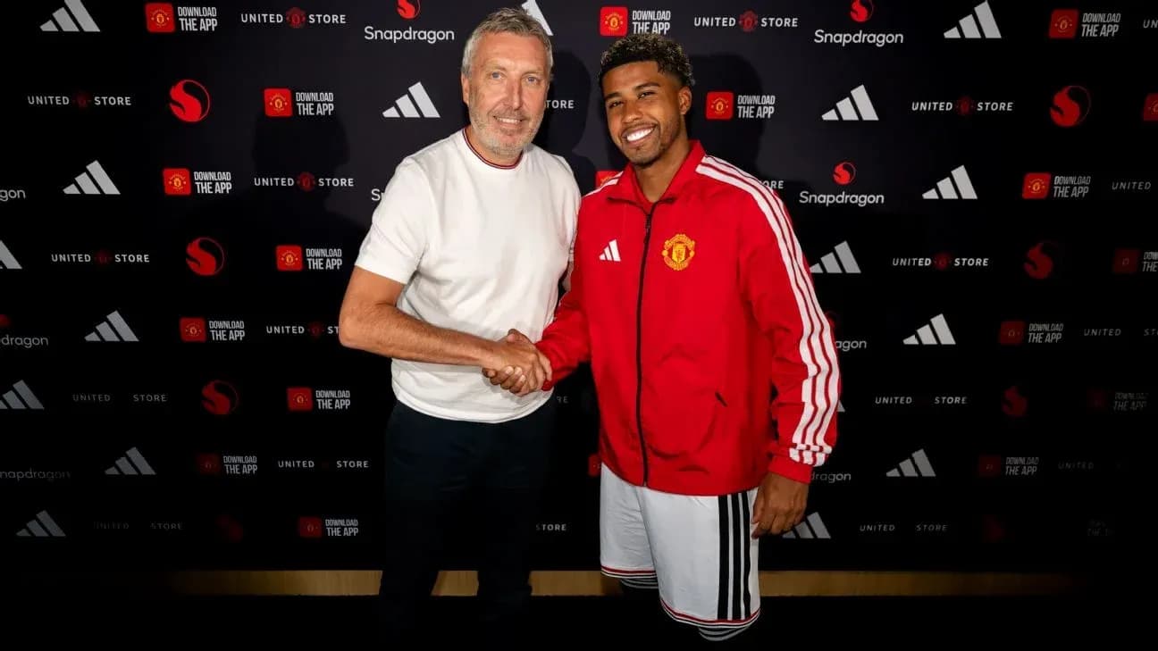 Two men shaking hands at promotional event