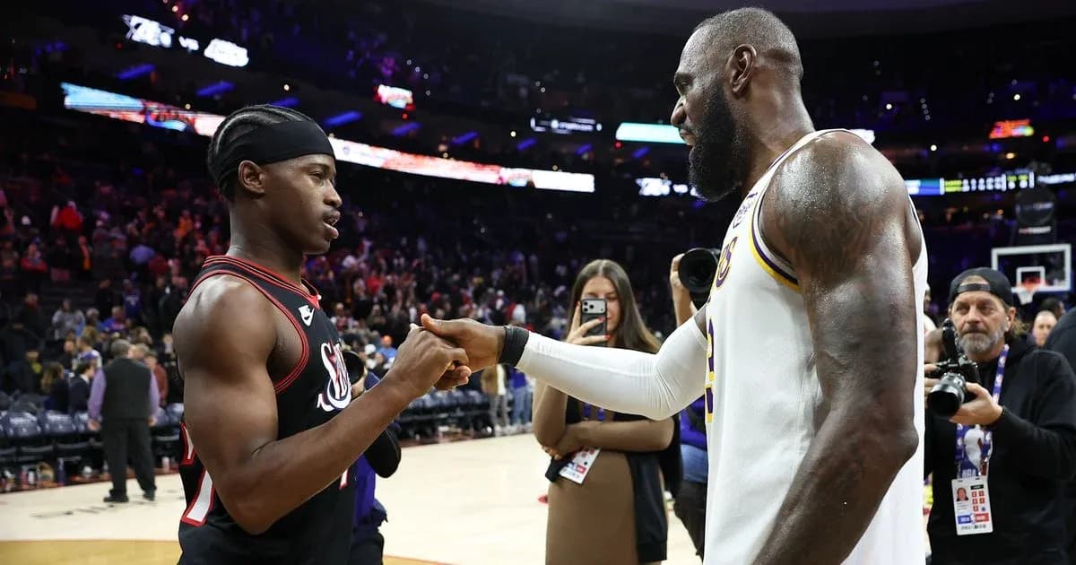 Two basketball players shaking hands after game