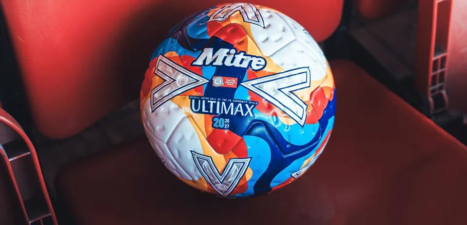 Mitre Ultimax football on stadium seat