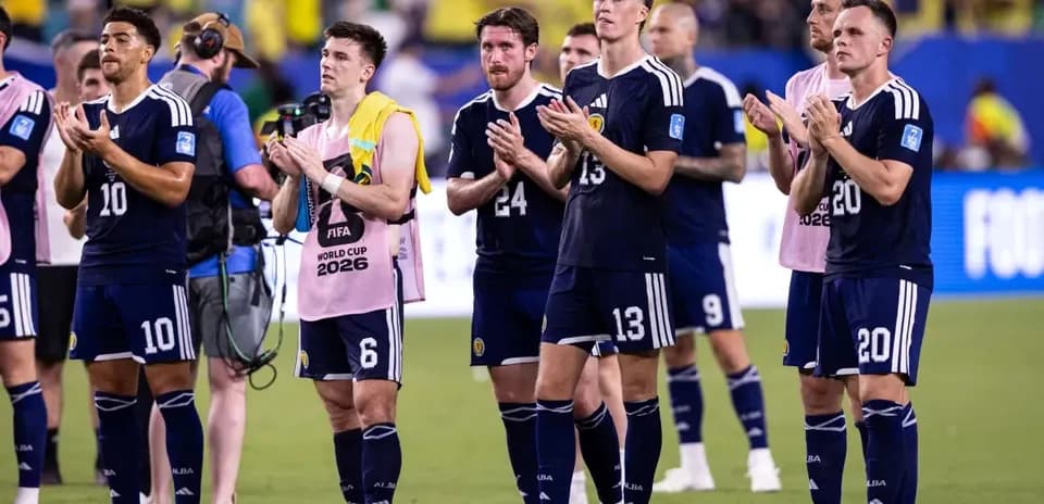 Scotland players applauding fans after the match