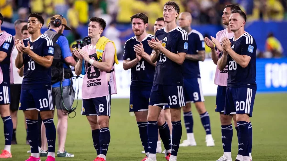 Scotland players applauding fans after the match