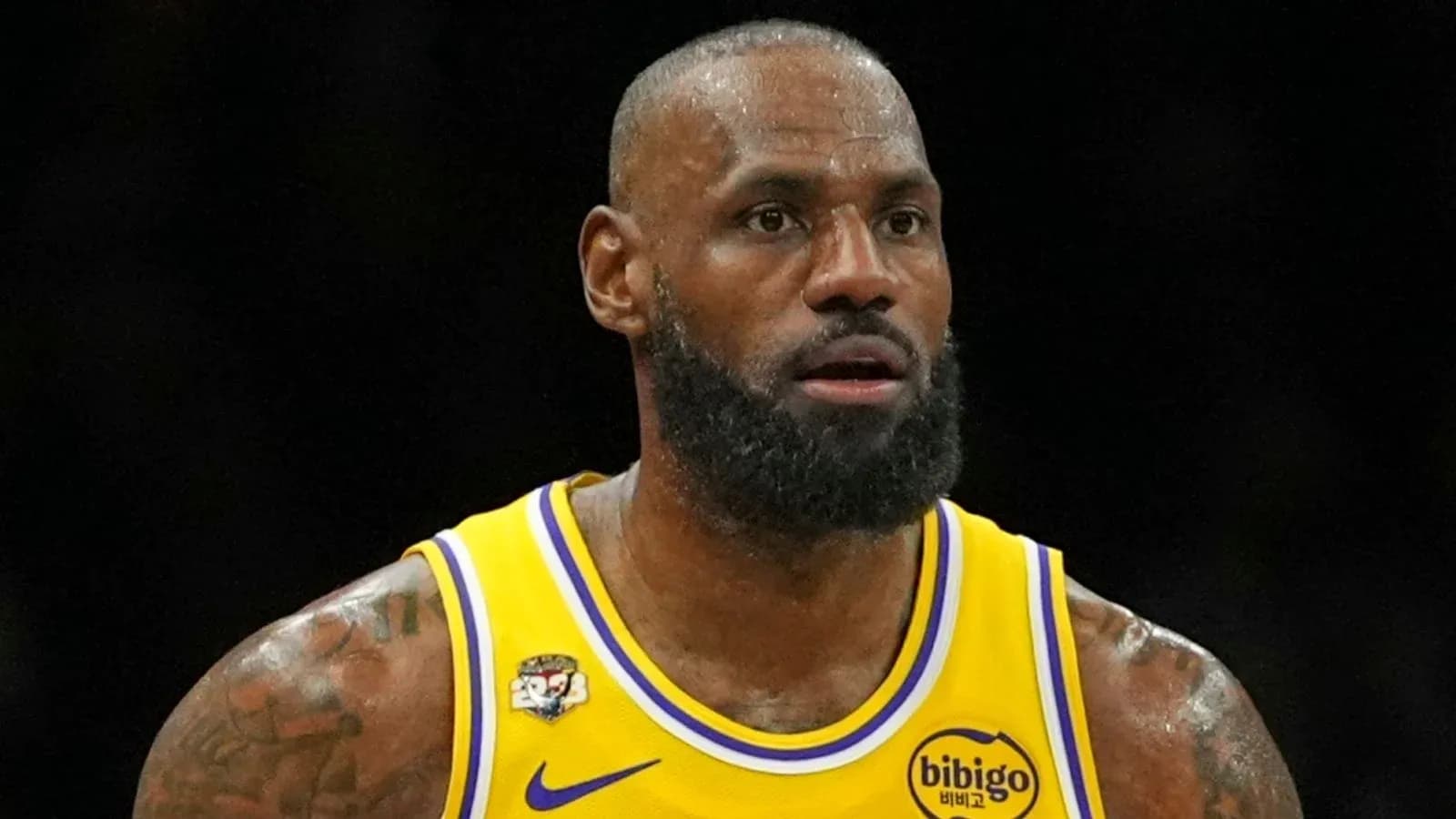LeBron James in Lakers uniform during game LeBron James in Lakers uniform during game