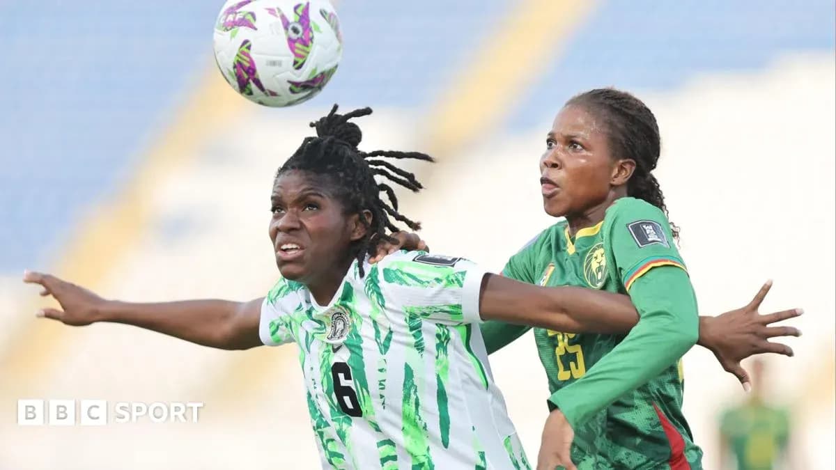 Two players contesting for the ball during match