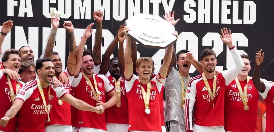 Arsenal players celebrating Community Shield victory