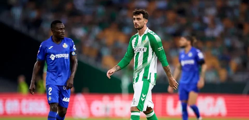Real Betis and Getafe players during match action