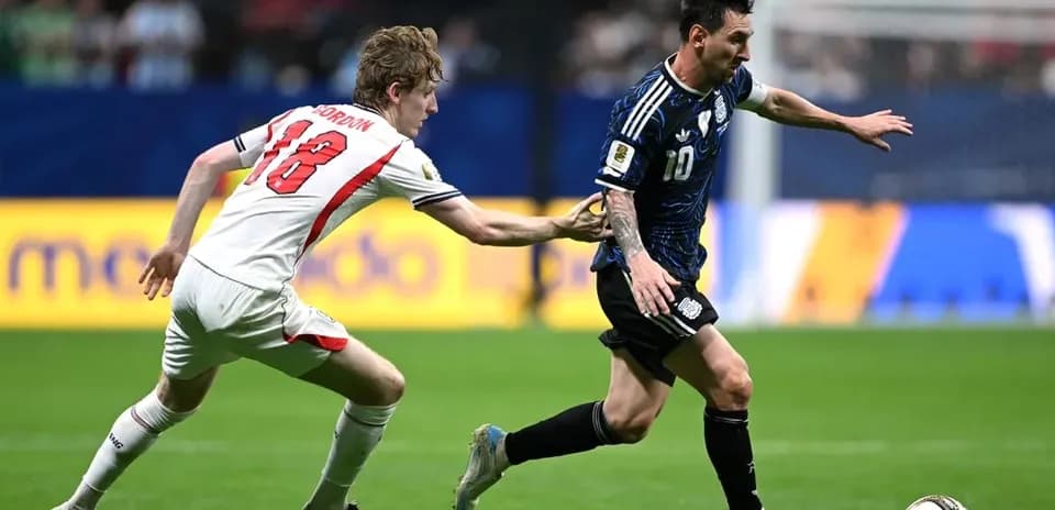 Player running with ball while being challenged