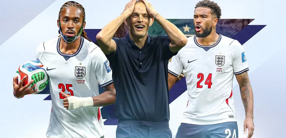 England players and coach during football match