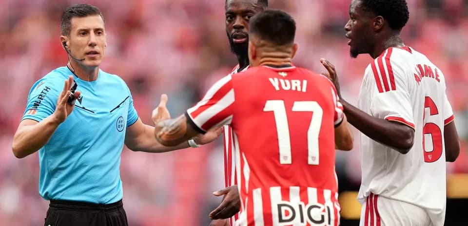 Referee communicating with players during match discussion