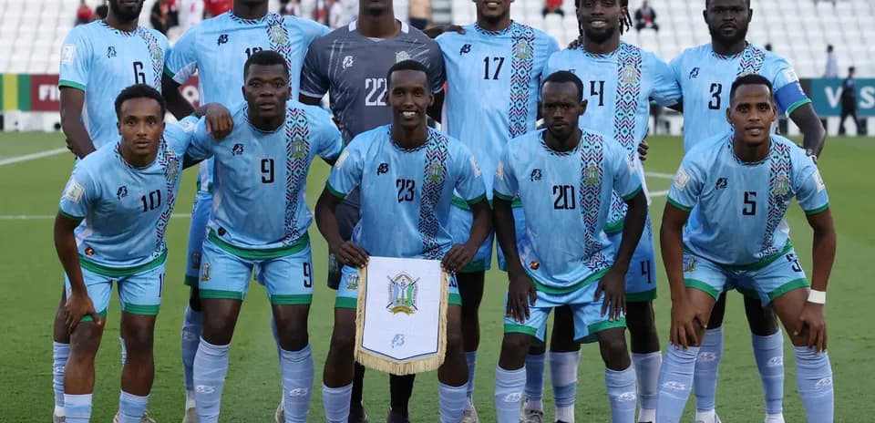 Football team posing for photo before match