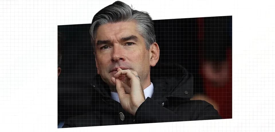 Man observing from the stands during a match