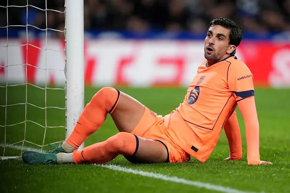 Goalkeeper sitting beside goalpost during match Goalkeeper sitting beside goalpost during match